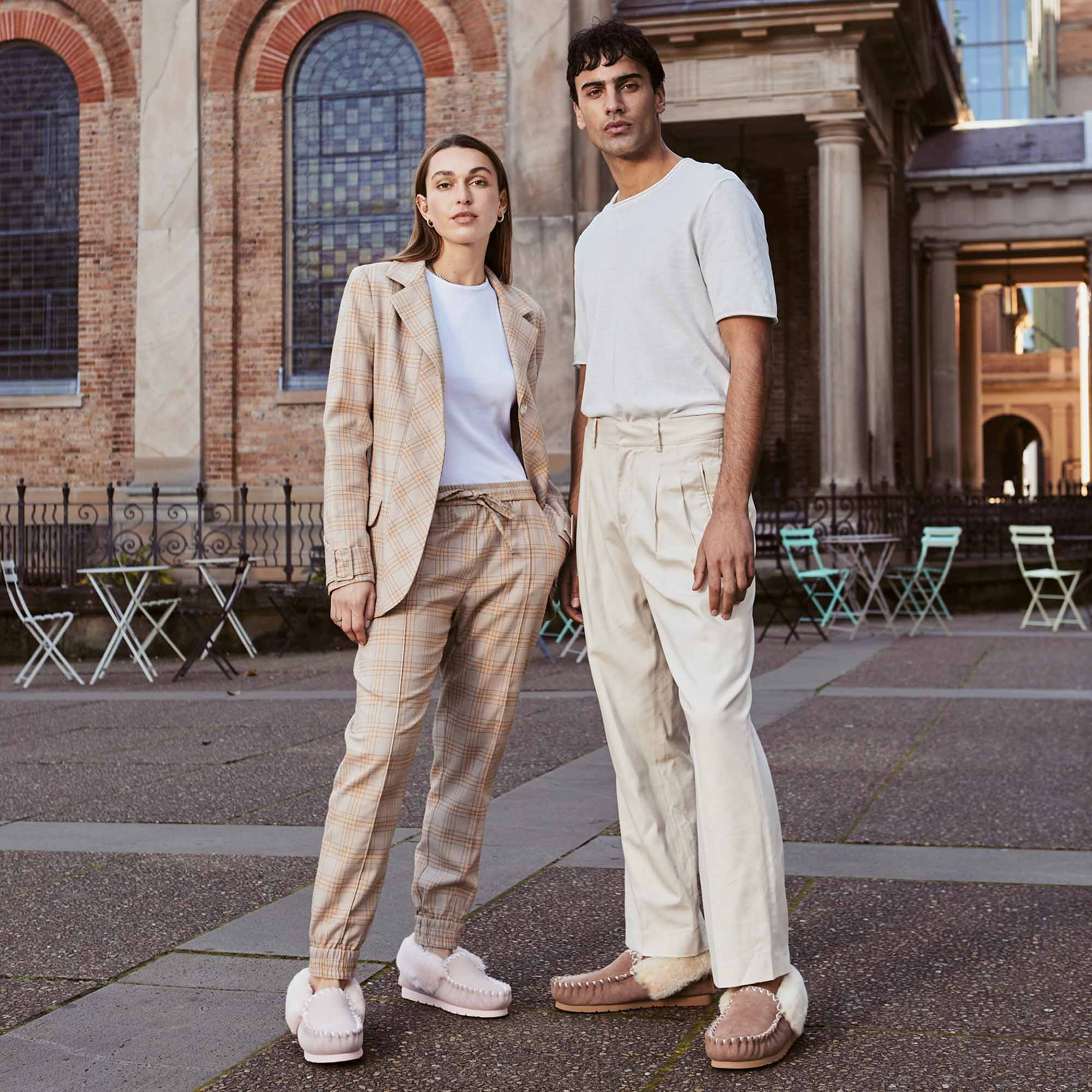 a couple in Australia wearing UGG Mocassins outside as an everyday footwear