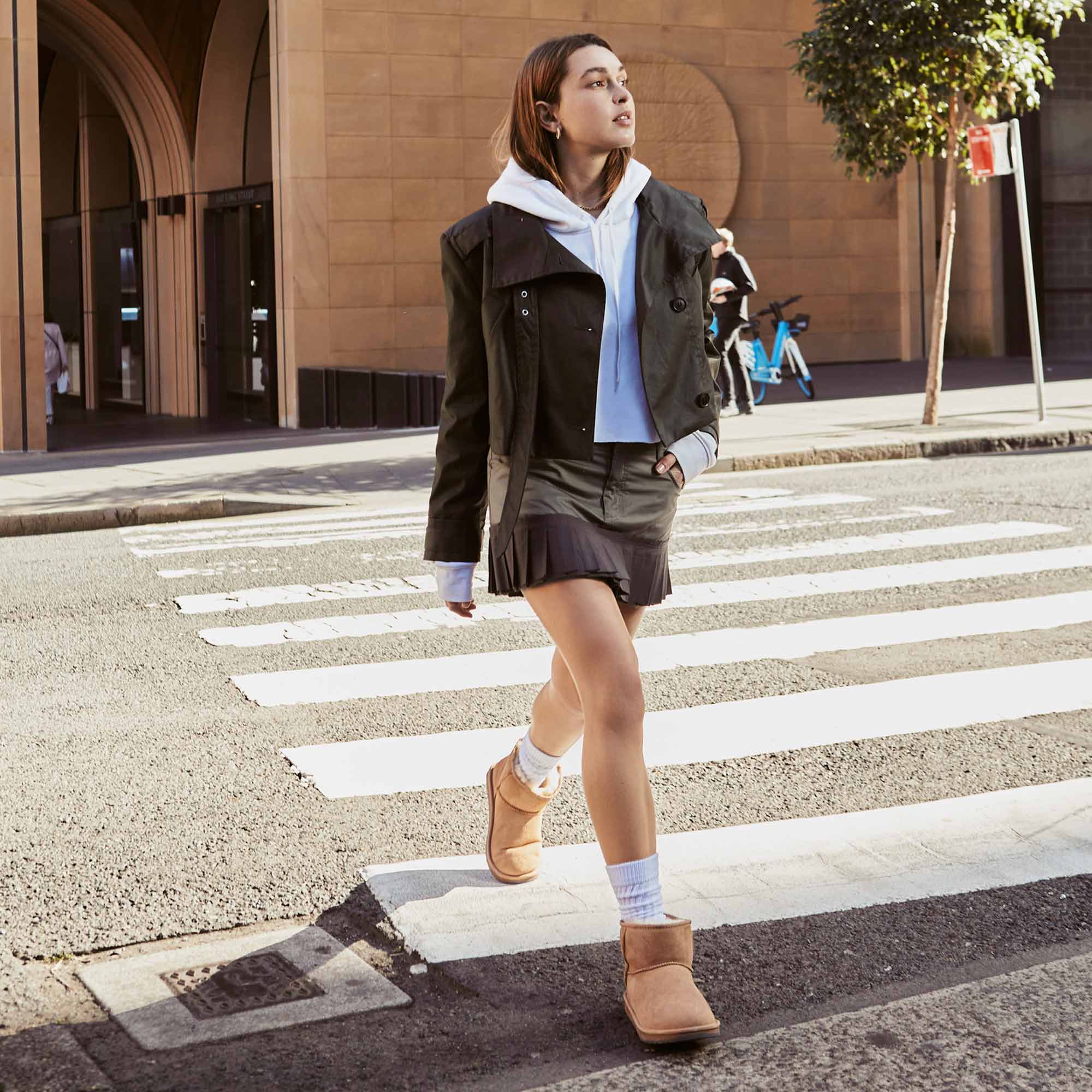a millenial styling UGG Classic mini out on the streets