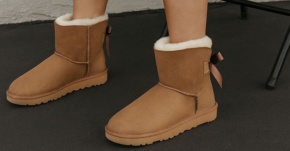 brown UGG boots with bows worn in platforms