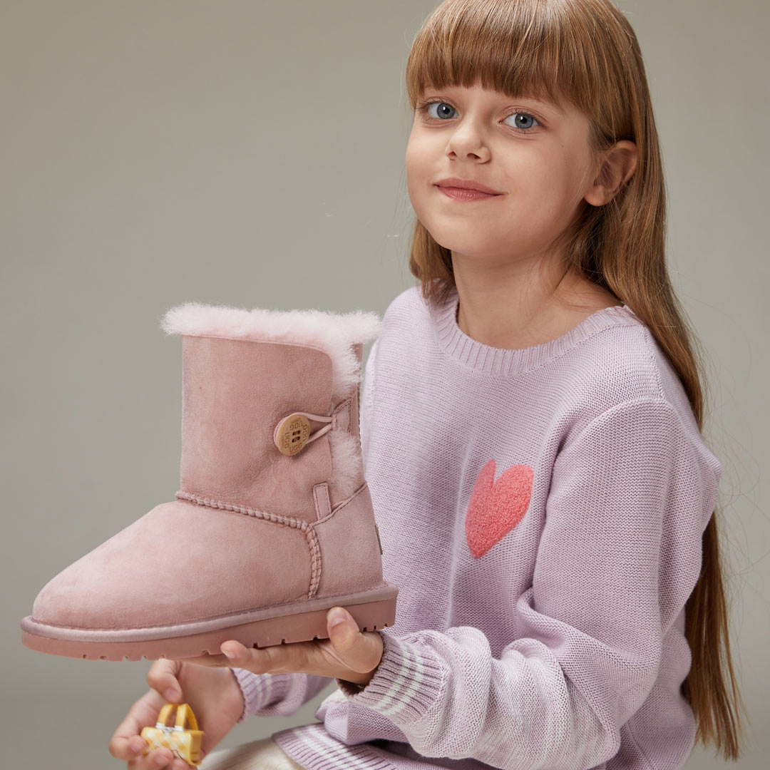 Australian Girl Holding Pink Classic UGG Boots