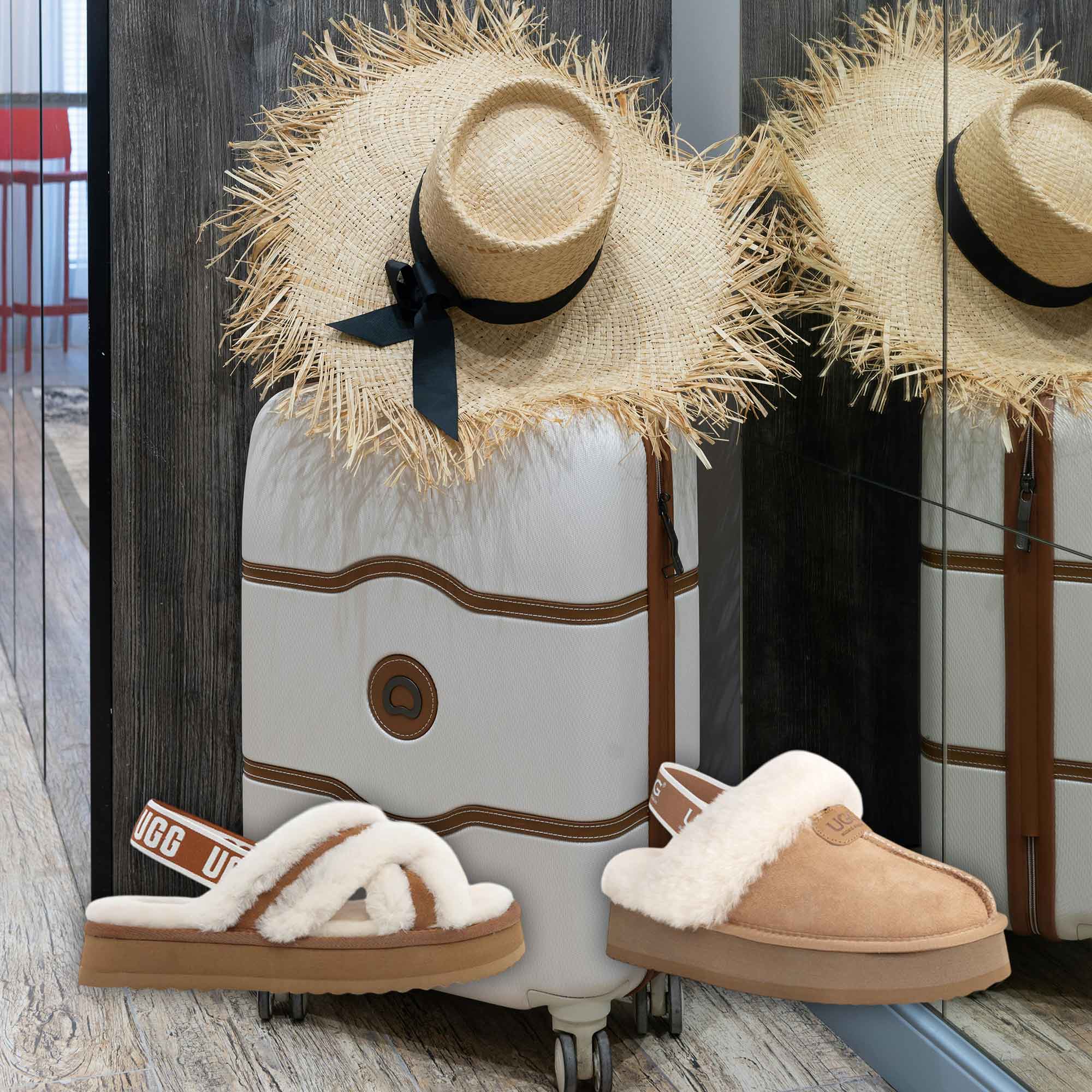 luggage ready for vacation in Bali with UGG slippers