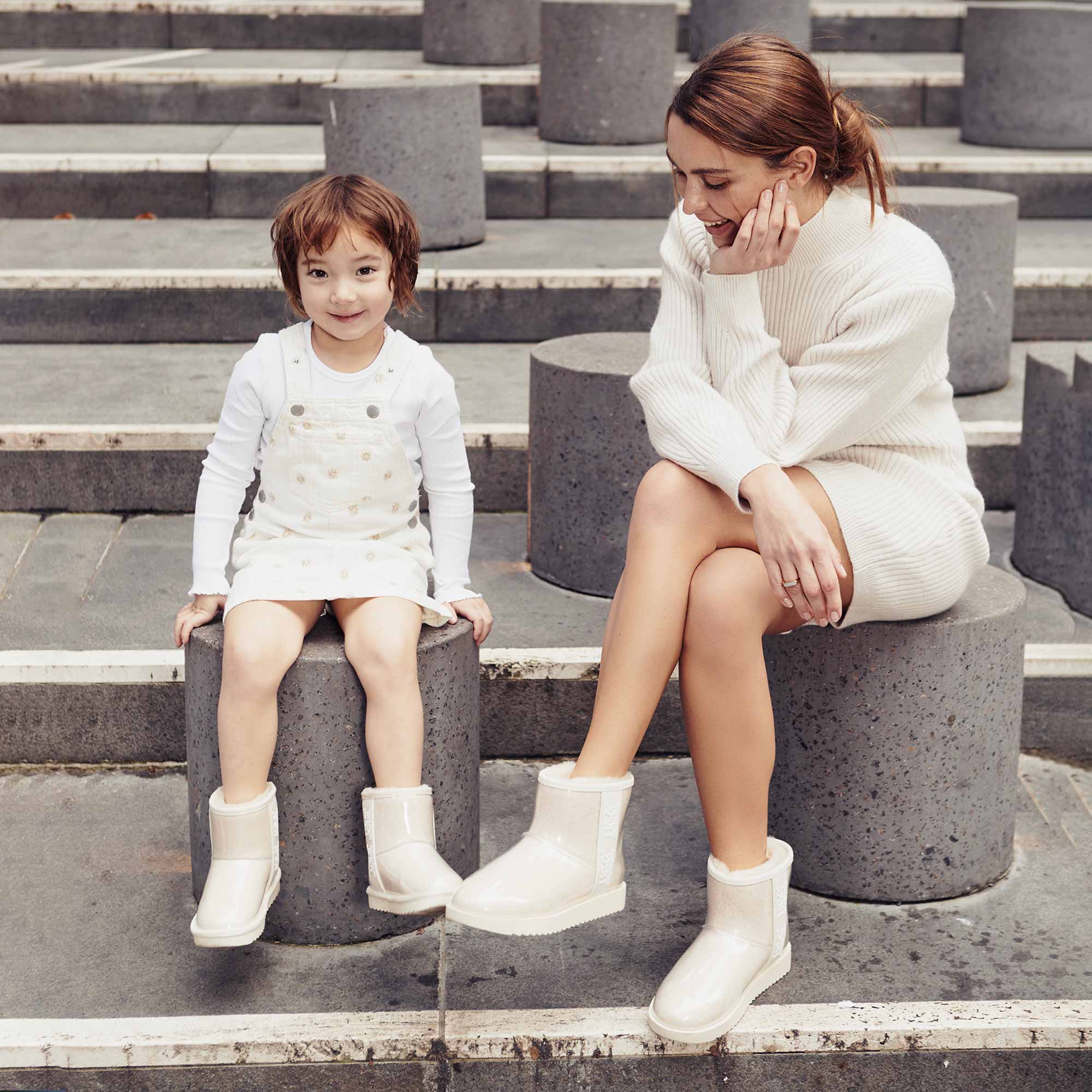 mother and daughter bonding and stylish while wearing age appropriate UGG boots