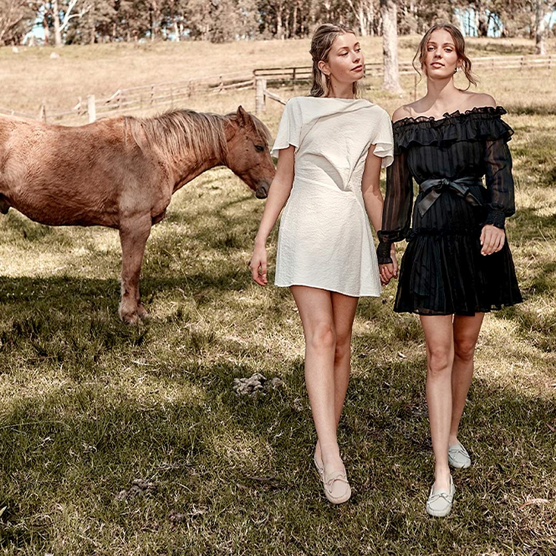 Two Female Tourists Visiting Australian Farm
