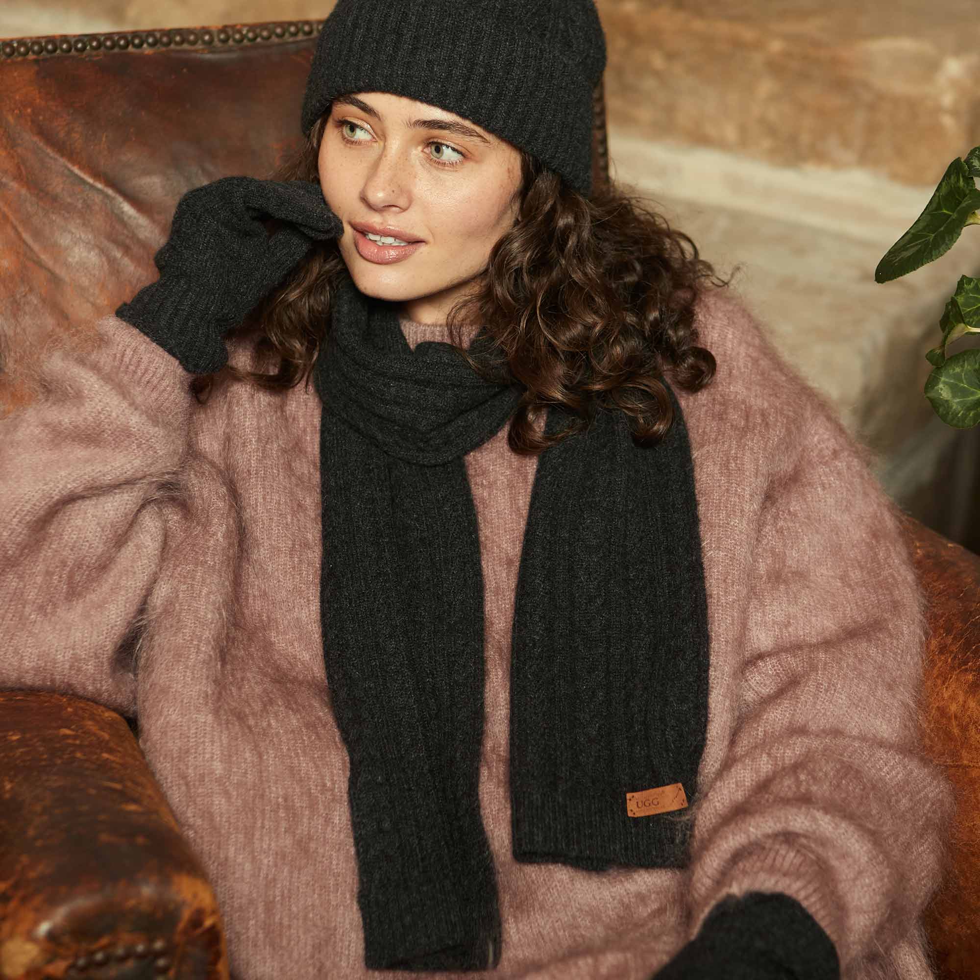 woman feeling cosy with her style of UGG scarf