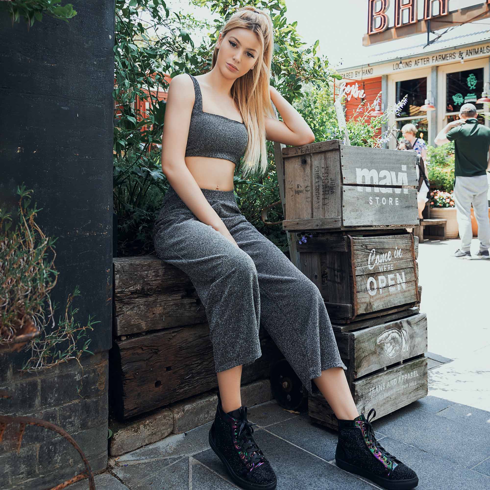 woman hanging out looking chic and comfy with UGG sneakers