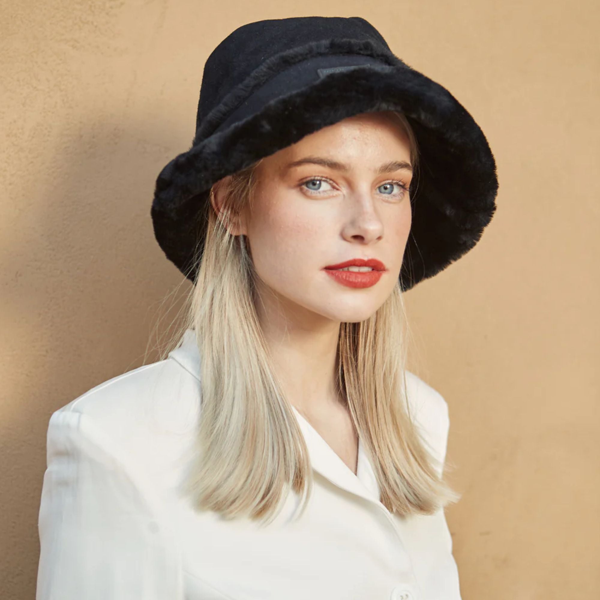 woman looking classy with her UGG bucket hat