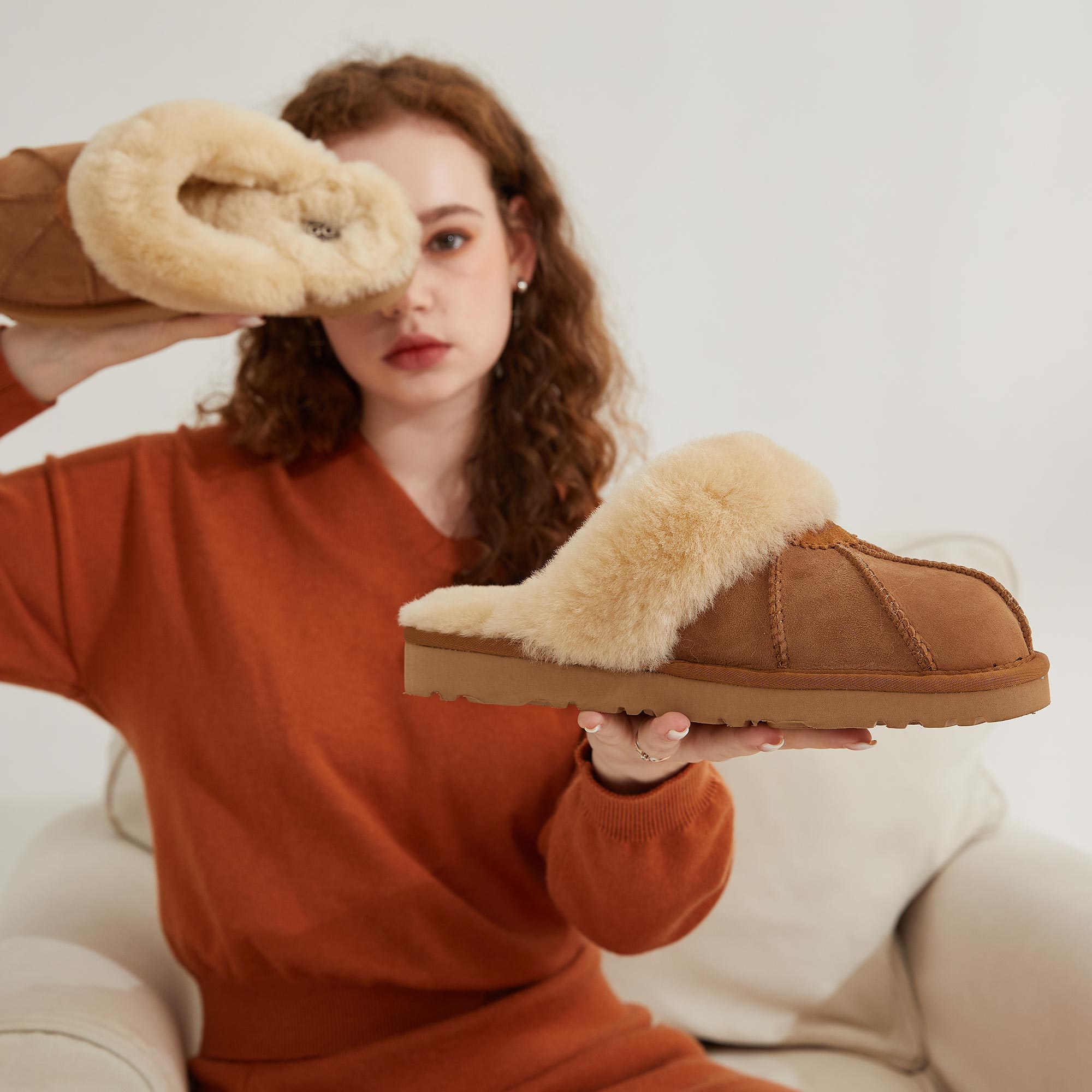 woman showing her cosiest footwear UGGs