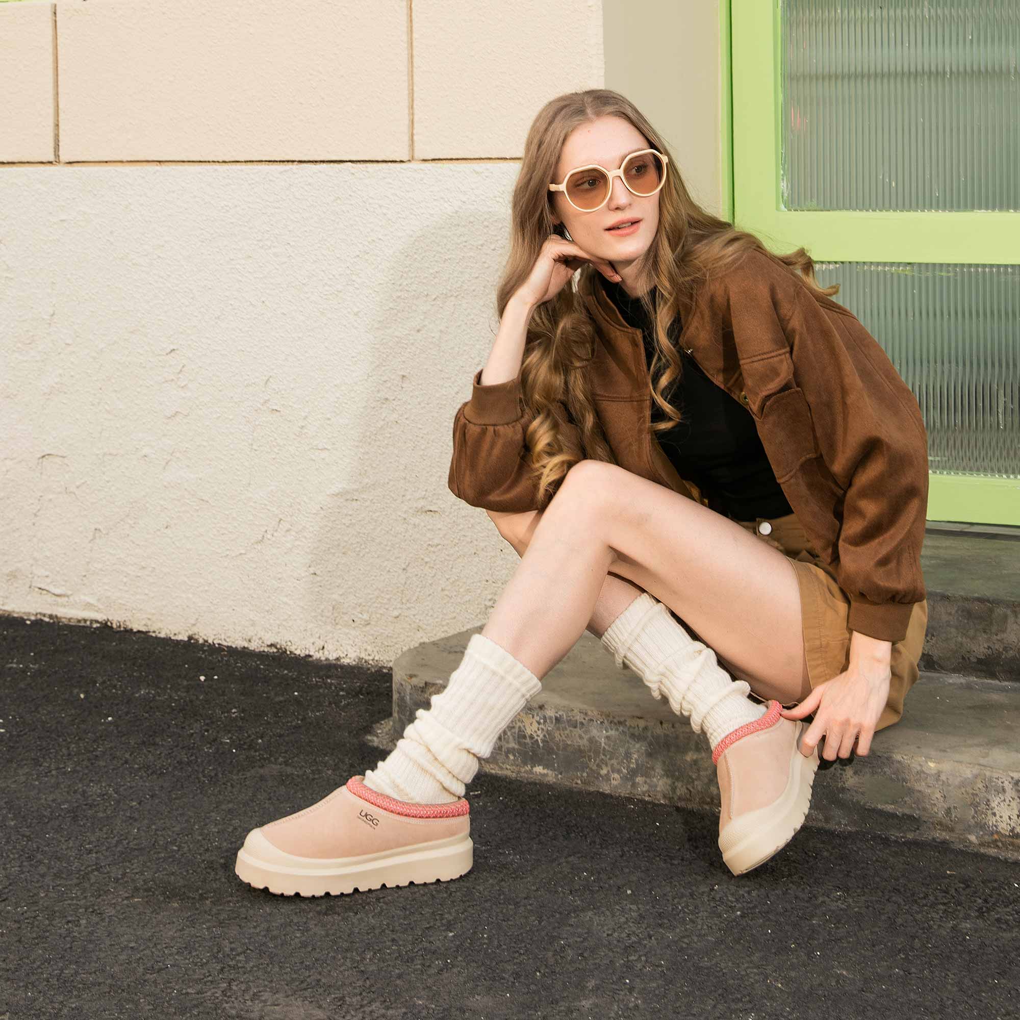 woman stylish while flexing her UGG slippers from UGG Original store