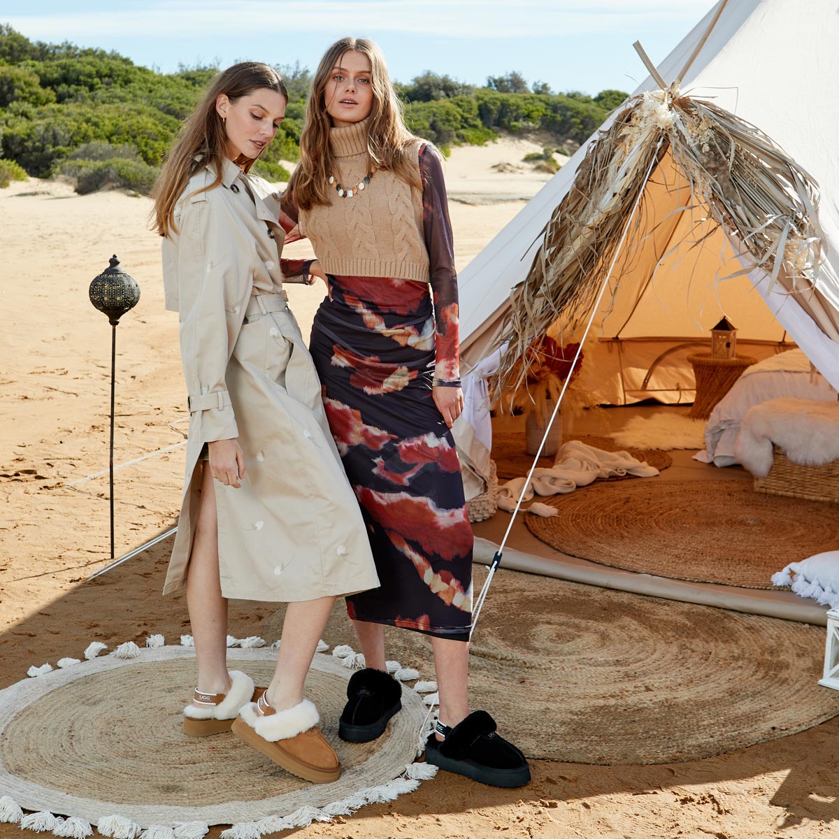 two girls in a camping tent wearing UGG scuffs