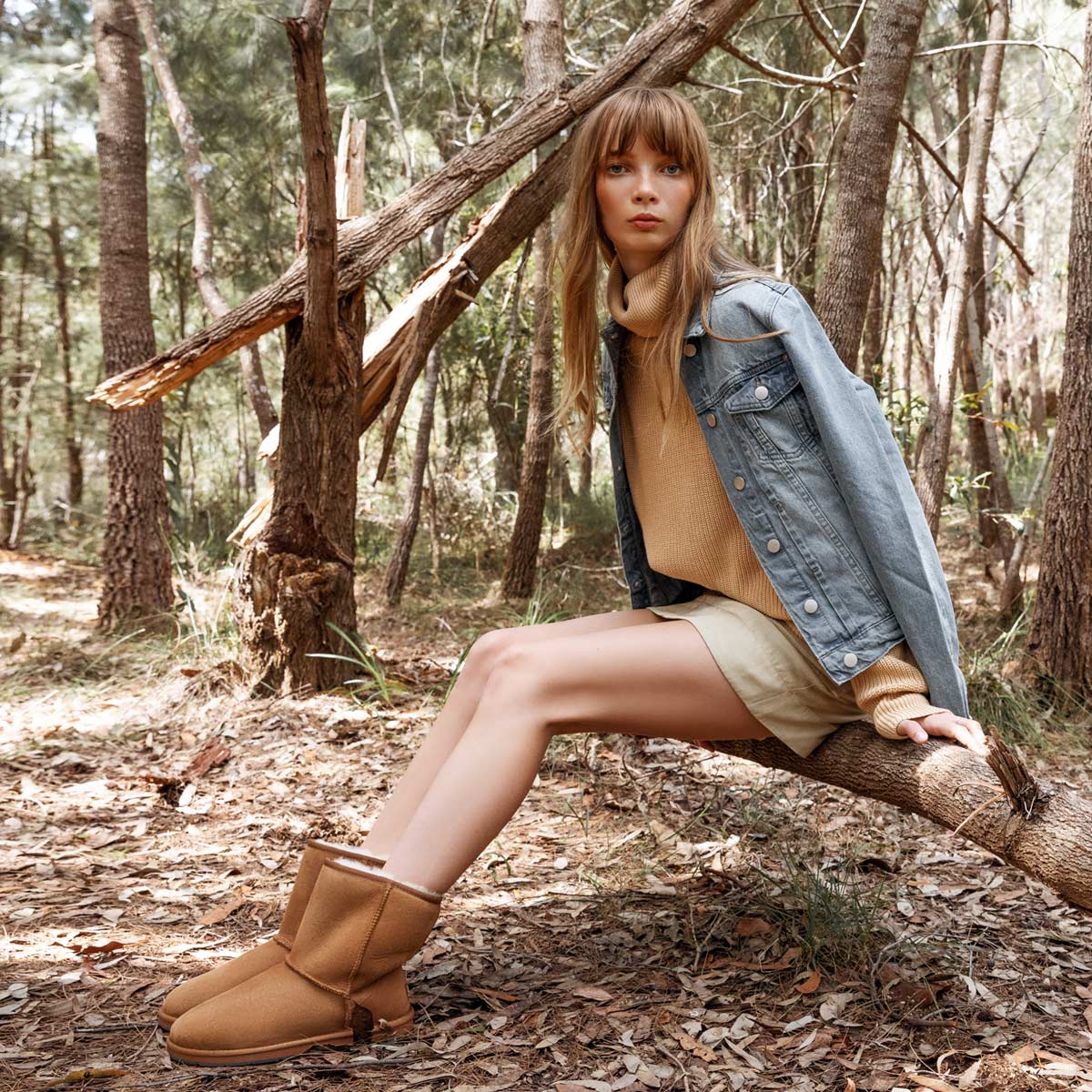 girl wearing ugg boots for a forest stroll